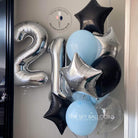 A festive balloon bouquet with a black and blue color scheme, featuring a number 21. Celebrate in style!