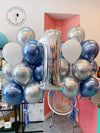 Blue and silver balloon bouquet with shiny balloons for a festive celebration.