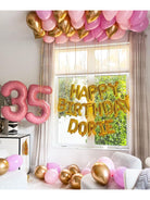 A festive birthday party with colorful balloons and decorations.